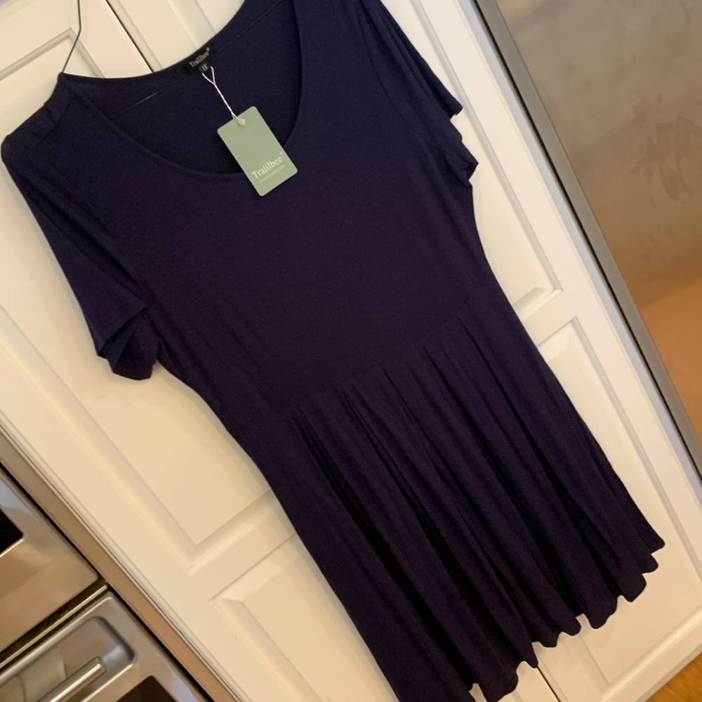 Tralilbee blue dress short sleeve. NWT pockets. Size 1X